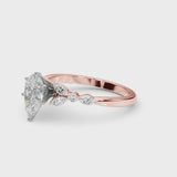 Rose gold Pear Cut Diamond Solitaire Ring with Side Stones and Four-Prong Setting