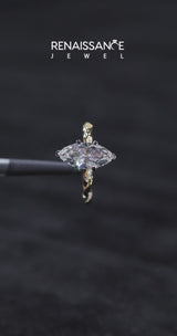Yellow gold Marquise Cut Diamond Solitaire Ring with Twisted Band and Pavé Accents