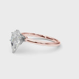 Rose gold Pear Cut Diamond Solitaire Engagement Ring with Classic Band and Four-Prong Setting