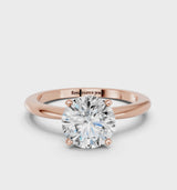 Rose gold Round Cut Diamond Solitaire Ring with Six-Prong Setting and Classic Band