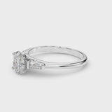 Silver Oval Solitaire with Tapered Baguette Side Stones on a Classic Band with Four-Prong Setting