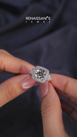 Silver Emerald Cut Diamond Halo Ring with Pavé Band and Four-Prong Setting
