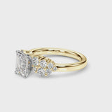 Yellow gold Emerald Cluster Diamond Engagement Ring with Pavé Band and Four-Prong Setting