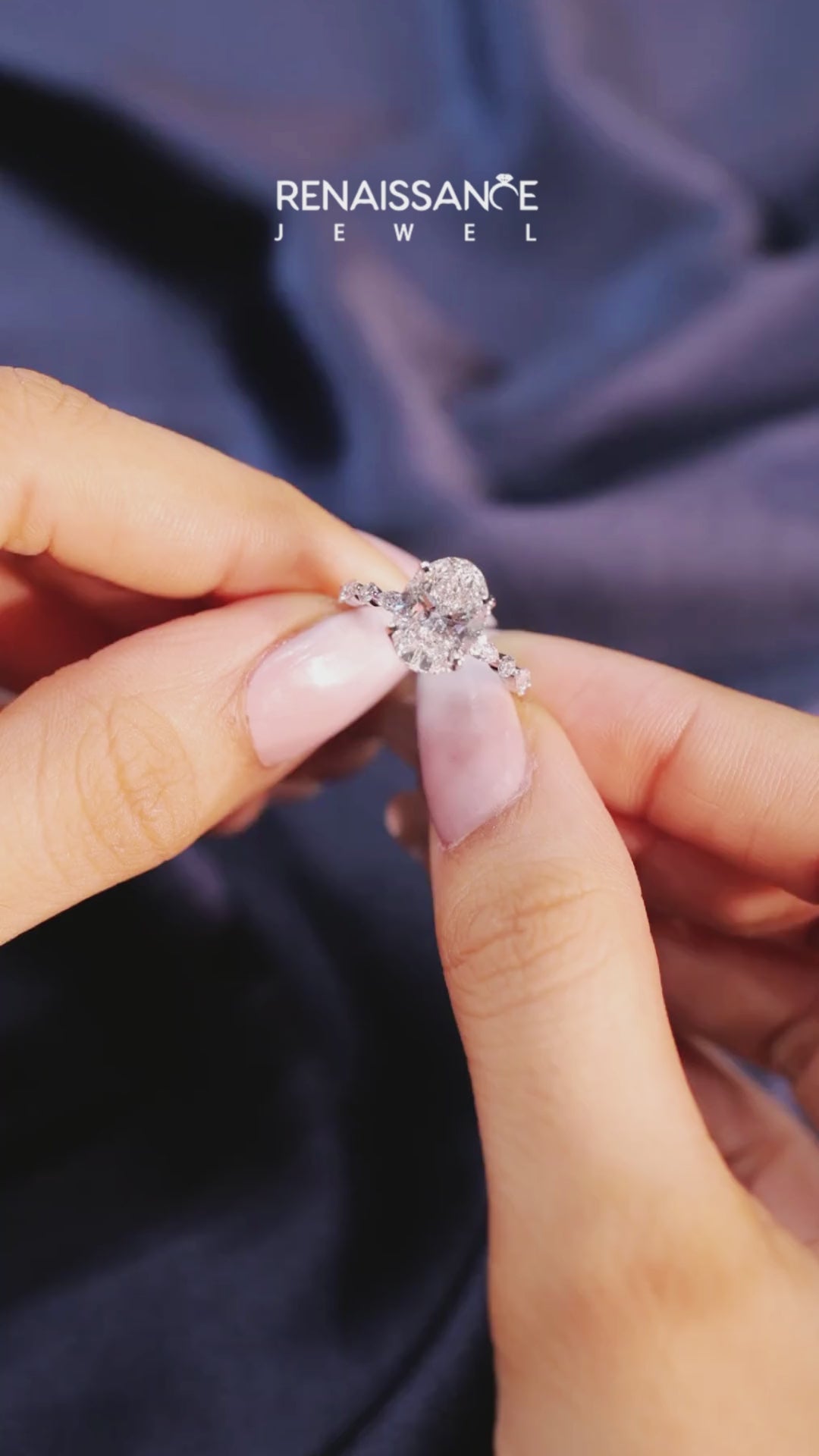 Platinum Oval Solitaire with Side Stones on a Pavé Band and Four-Prong Setting 3