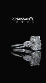 Platinum Radiant Cut Diamond Three-Stone Ring with Pear Side Stones and Prong Setting