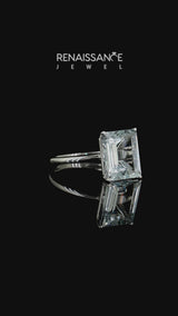Silver Emerald Cut Aquamarine Solitaire Engagement Ring with Round Band and Four-Prong Setting