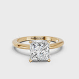 Yellow gold Princess Cut Diamond Solitaire Ring with Six-Prong Setting and Classic Band