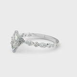 White gold Marquise Cut Diamond Ring with Marquise and Round  Side Stones and Four-Prong Setting