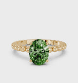 Yellow gold Fancy Green Oval Cut Diamond Solitaire Ring with Beaded Band and Prong Setting