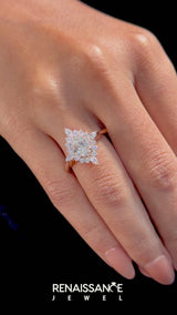 Rose gold Oval Halo Diamond Cluster Ring with Marquise and Round Stones on a White Gold Band with Prong Setting