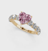 Yellow gold Fancy Pink Heart Cut Diamond Prong Setting with Side Stones on a Pave Band