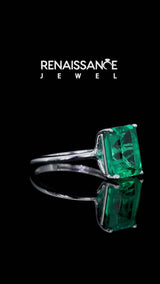 Silver Emerald Cut Emerald Solitaire Engagement Ring with Round Band and Four-Prong Setting