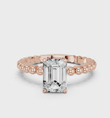 Rose gold Emerald Cut Diamond Solitaire Ring with Beaded Band and Prong Setting