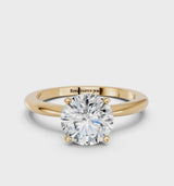 Yellow gold Round Cut Diamond Solitaire Ring with Six-Prong Setting and Classic Band