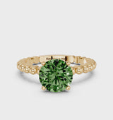 Yellow gold Fancy Green Round Cut Diamond Solitaire Ring with Beaded Band and Prong Setting