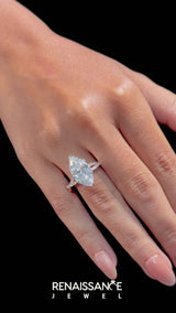 Rose gold Marquise Cut Diamond Solitaire Engagement Ring with Twisted Pavé Band and Four-Prong Setting