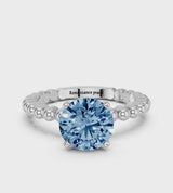 Silver Fancy Blue Round Cut Diamond Solitaire Ring with Beaded Band and Prong Setting