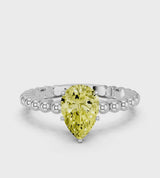 Platinum Fancy Yellow Pear Cut Diamond Solitaire Ring with Beaded Band and Prong Setting
