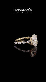 Yellow gold Oval Cut Diamond Ring with Marquise Side Stones and Prong Setting