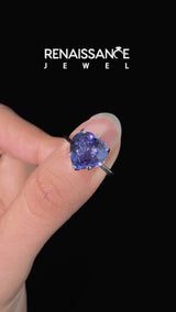 Silver Heart Cut Tanzanite Solitaire Ring with Flower Prong Setting and Classic Band