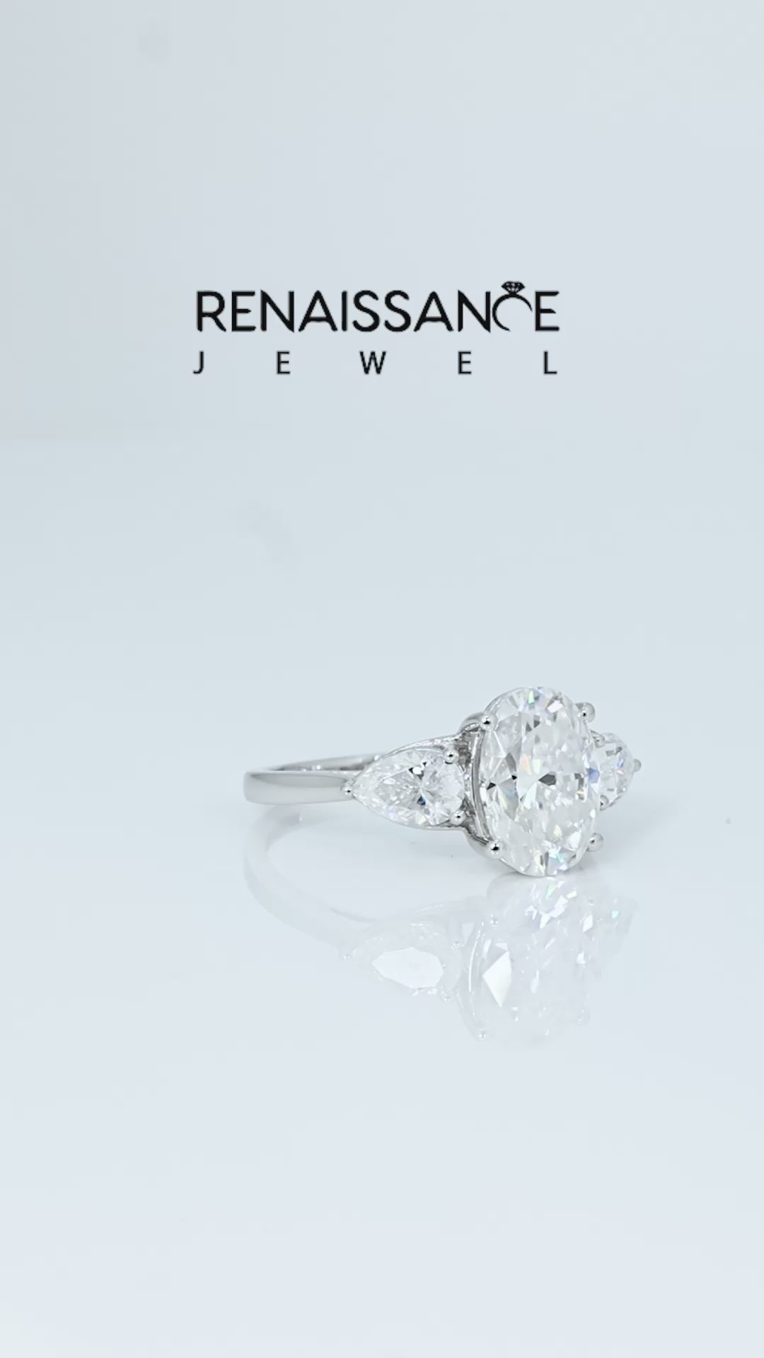 Silver Oval Cut Moissanite Three-Stone Ring with Pear  Side Stones and Prong Setting_13