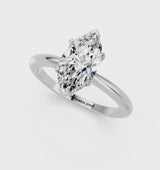 White gold Marquise Cut Diamond Solitaire Ring with Six-Prong Setting and Classic Band