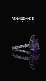 Silver Pear Cut Amethyst Side Stone Solitaire Ring with Round and Four-Prong Setting