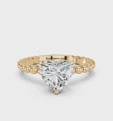 Yellow gold Heart Cut Diamond Solitaire Ring with Beaded Band and Prong Setting
