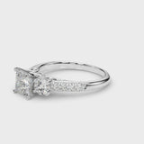 Platinum Three-Stone Round Cut Diamond Pavé Band with Four-Prong Setting