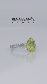Silver Pear Cut Yellow Sapphire Side Stone Solitaire Ring with Round and Four-Prong Setting