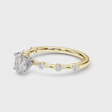 Yellow gold Oval Solitaire Diamond Ring with Bezel Set Side Stones and Prong Setting