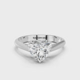 White gold Heart Cut Diamond Solitaire Engagement Ring with Cathedral Setting and Four-Prong Mount