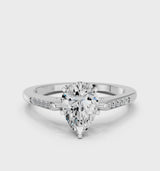 White gold Pear Cut Channel Set Solitaire Engagement Ring with Four-Prong Setting