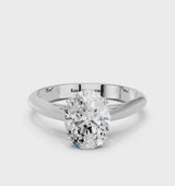 White gold Oval Cut Diamond Solitaire Engagement Ring with Cathedral Setting and Four-Prong Mount