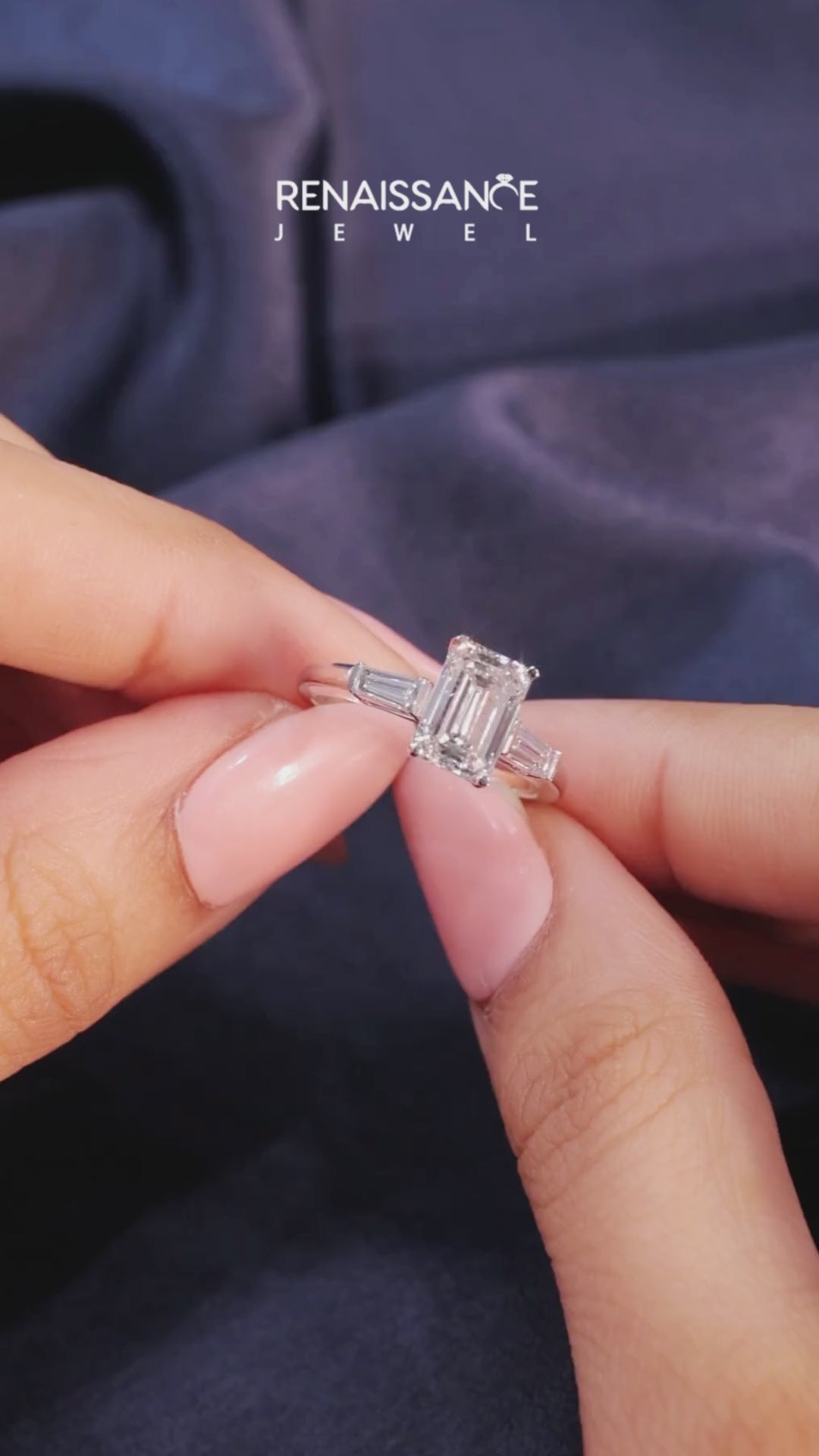 White gold Emerald Solitaire with Tapered Baguette Side Stones on a Classic Band with Four-Prong Setting 4