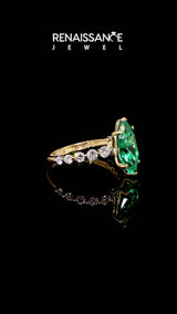 Yellow gold Marquise Cut Solitaire Emerald Ring with Pave Band and Four-Prong Setting