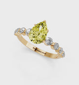 Yellow gold Fancy Yellow Pear Cut Solitaire Diamond Ring with Pave Band and Four-Prong Setting