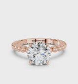 Rose gold Round Cut Diamond Solitaire Ring with Beaded Band and Prong Setting