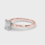 Rose gold Emerald Solitaire Diamond Ring with Four-Prong Setting and Classic Band