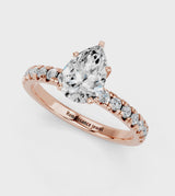 Rose gold Pear Solitaire Pave Diamond Engagement Ring with Four-Prong Setting