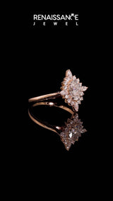 Rose gold Oval Halo Diamond Cluster Ring with Marquise and Round Stones on a White Gold Band with Prong Setting