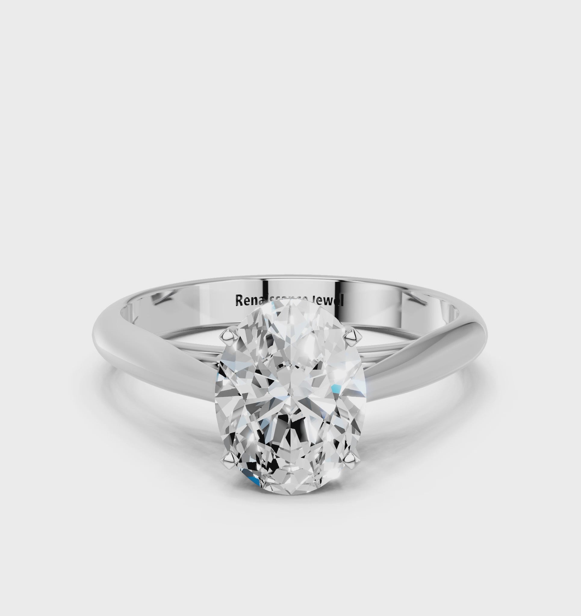 White gold Oval Solitaire Diamond Engagement Ring with Cathedral Setting and Four-Prong Mount on a Classic Band_136