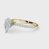 Yellow gold Pear Cut Diamond Solitaire Ring with Pavé Accents and Four-Prong Setting