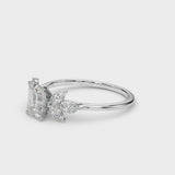 White gold Emerald Diamond Floral Cluster Ring with Marquise Side Stones and Six-Prong Solitaire Setting