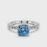 White gold Fancy Blue Cushion Cut Diamond Solitaire Pavé Band with Four-Prong Setting