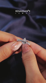 Silver Pear Cut Diamond Side Stone Solitaire Ring with Round  and Four-Prong Setting