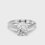 Platinum Radiant Cut Diamond Solitaire Engagement Ring with Cathedral Setting and Four-Prong Mount
