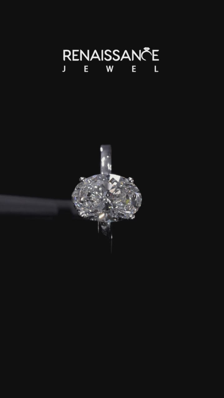 Silver Oval Solitaire Ring with Four-Prong Setting on a Classic Band 4