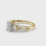 Yellow gold Emerald Cut Diamond Three-Stone Ring with Pavé Split Shank and Four-Prong Setting