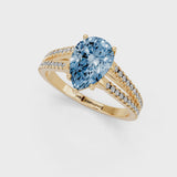 Yellow gold Fancy Blue Pear Cut Diamond Solitaire Engagement Ring with Split Shank Pavé Band